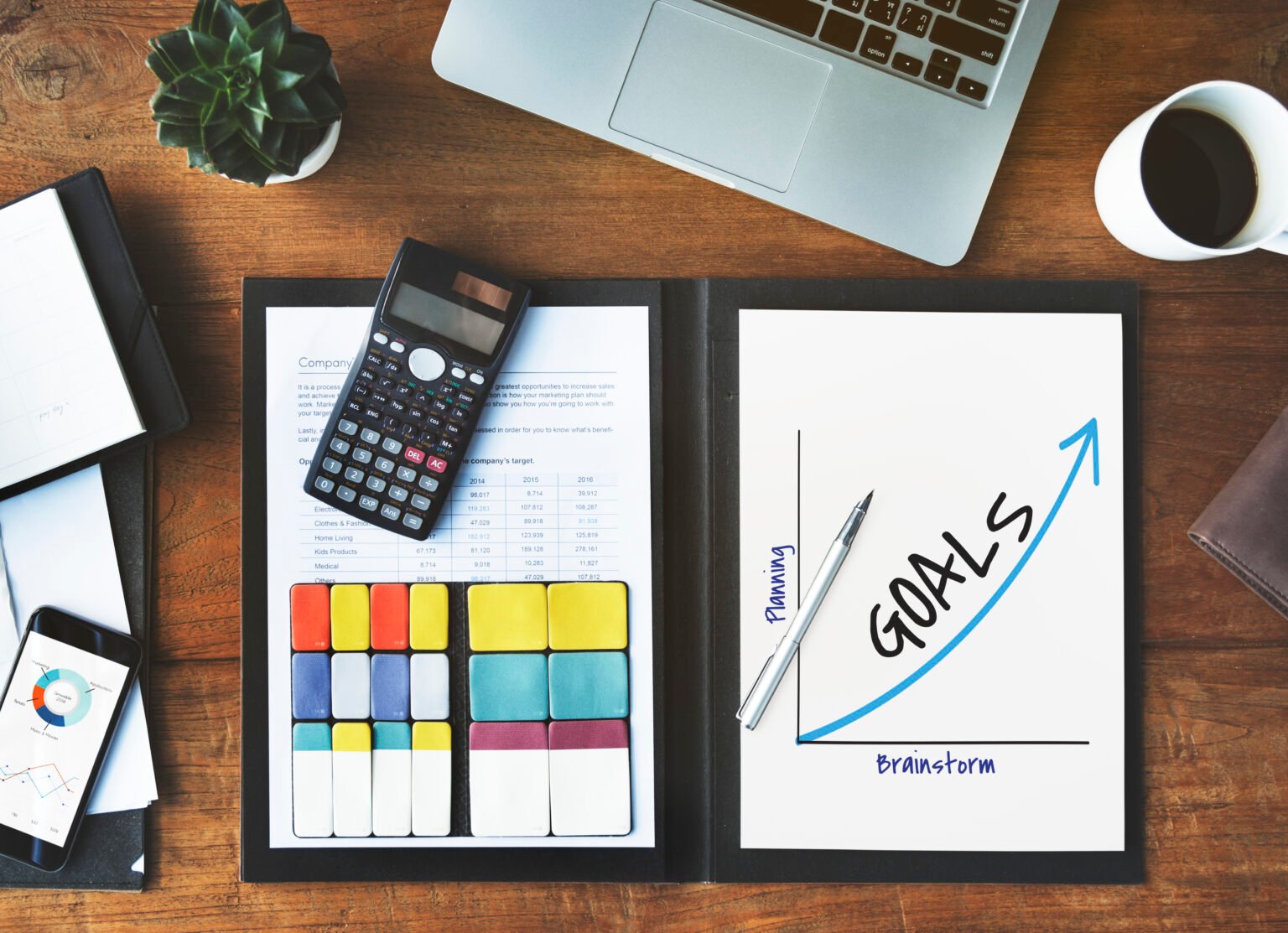 Business meeting with solution proposal and goals chart