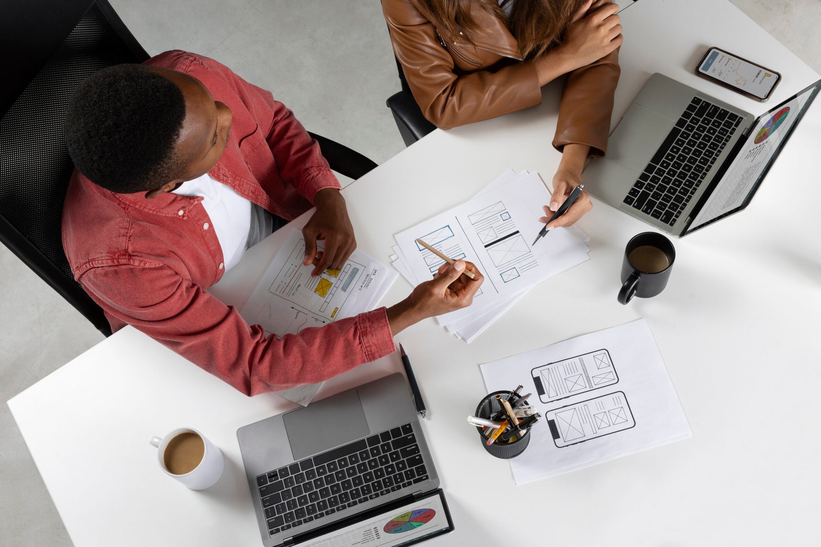 Modern office workspace with team collaborating